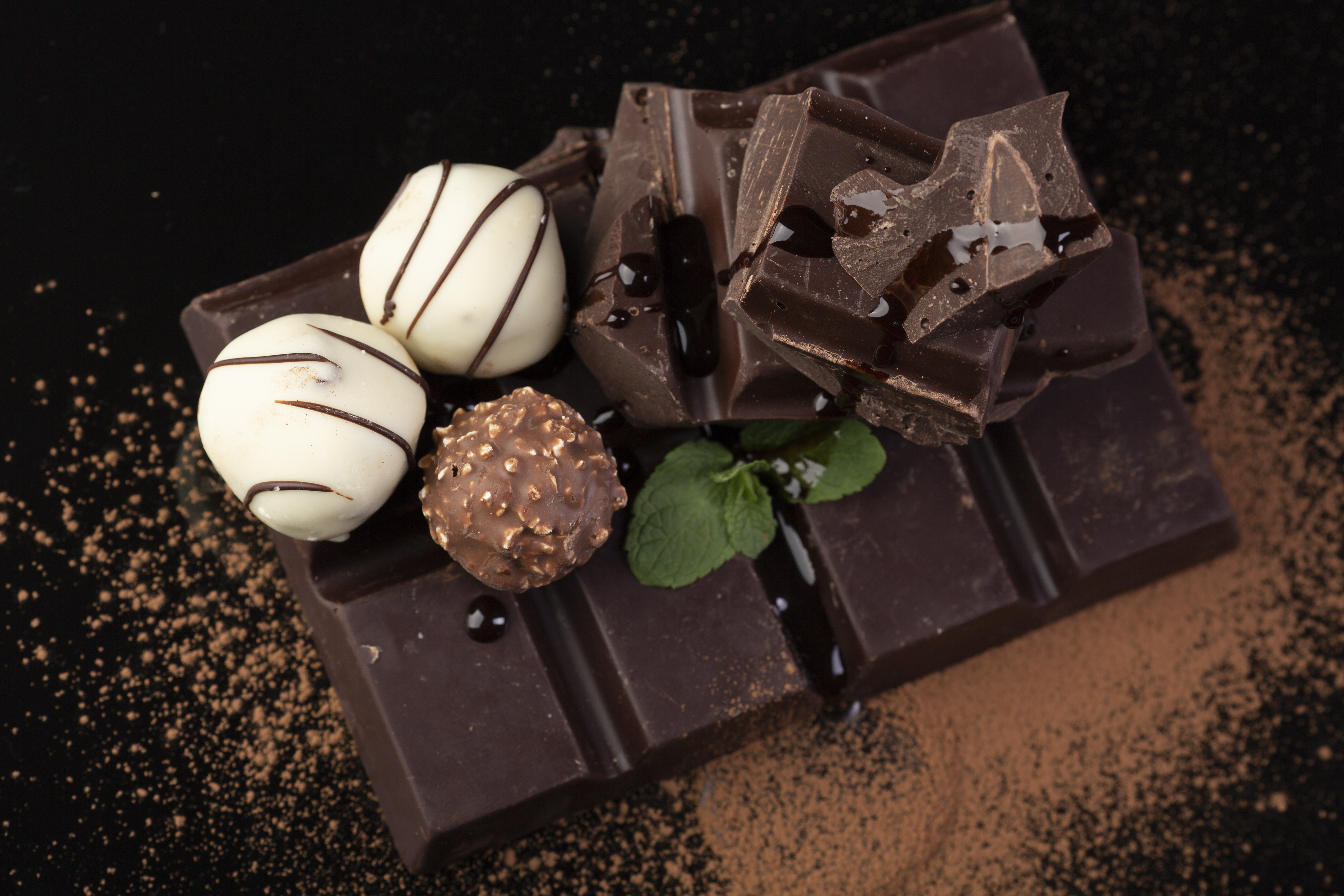 Dark chocolate pieces on a board